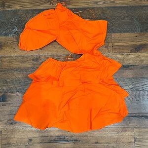 One sleeve orange dress